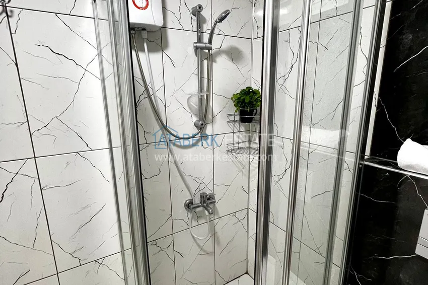 Приобрести Квартира 1+1 меблированная в Газипаше в молодом комплексе городского типа 10 