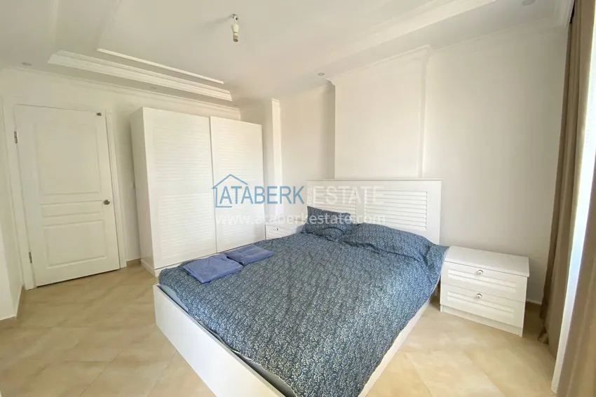 Приобрести Двухкомнатная квартира с мебелью и видом на море в комплексе на первой береговой, район Тосмур – Алания  11 