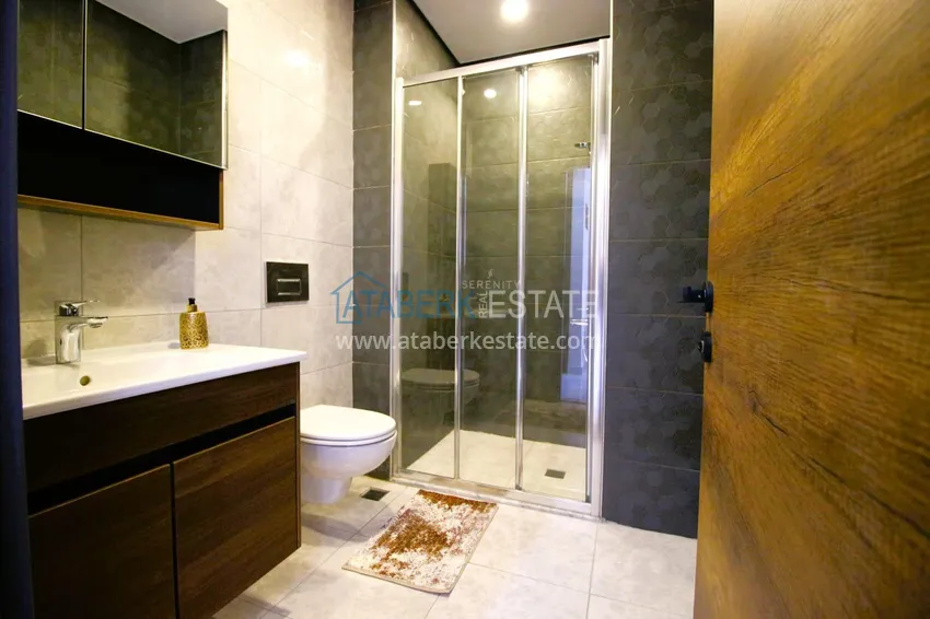 Приобрести Квартира 1+1 меблированная в комплексе с богатой инфраструктурой, район Махмутлар – Алания 13 