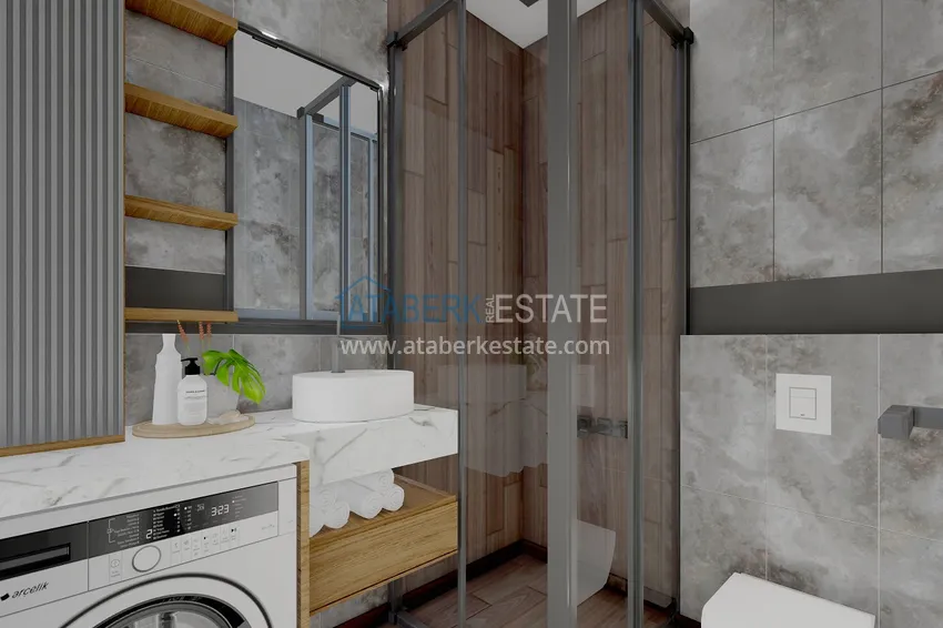 Приобрести Новый проект резиденции в центре Алании – 100 метров от пляжа Кейкубат 18 