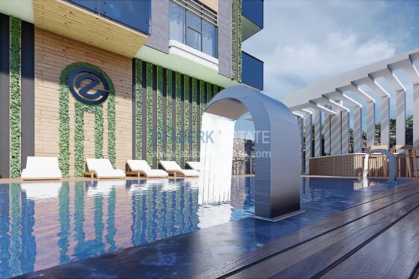 Новый проект резиденции сегмента комфорт в центре Алании, район пляжа Клеопатра 16 