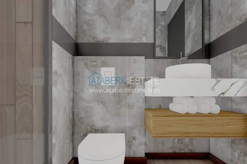 Приобрести Новый проект резиденции в центре Алании – 100 метров от пляжа Кейкубат 19 