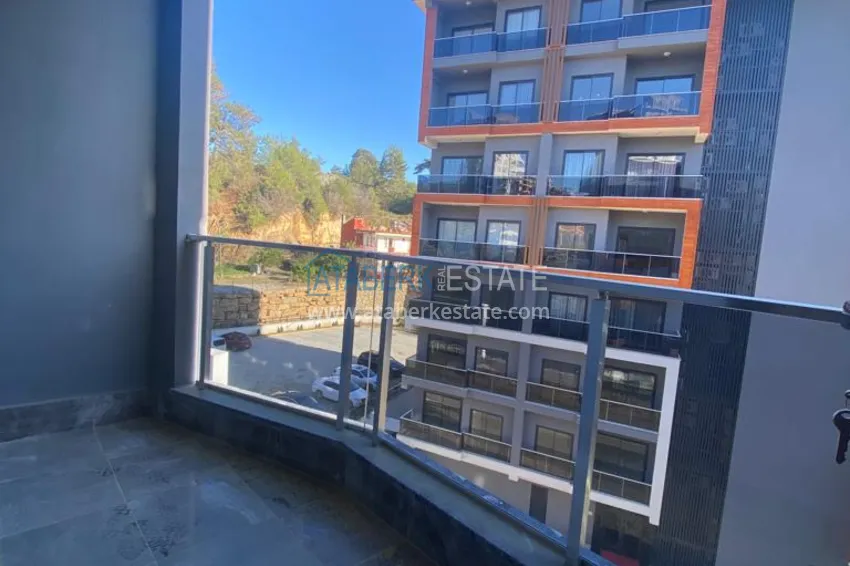 Приобрести Двухкомнатные квартиры в Алании, район Авсаллар 17 