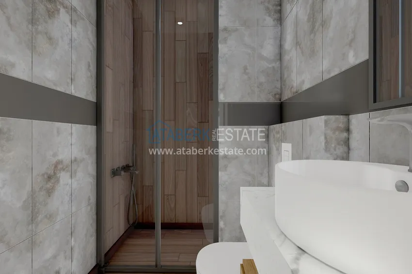 Приобрести Новый проект резиденции в центре Алании – 100 метров от пляжа Кейкубат 20 