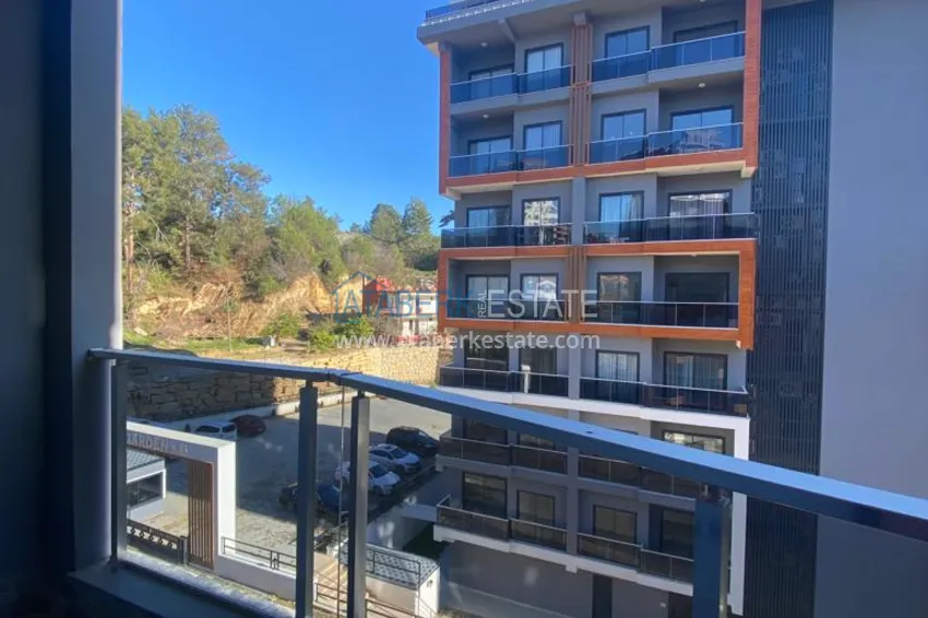 Приобрести Двухкомнатные квартиры в Алании, район Авсаллар 18 