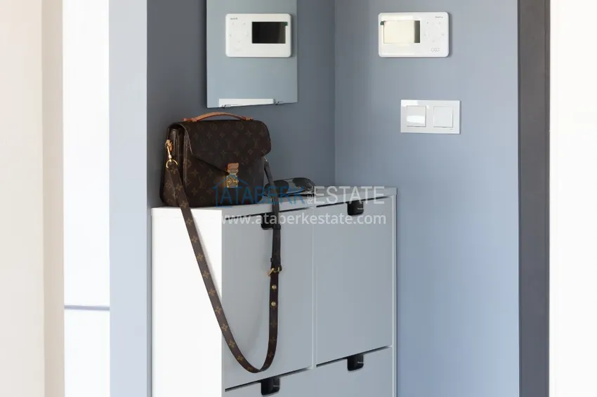 Приобрести Квартира 1+1 меблированная с дизайнерским интерьером в новостройке, район Авсаллар – Алания. Подходит для краткосрочной аренды 16 