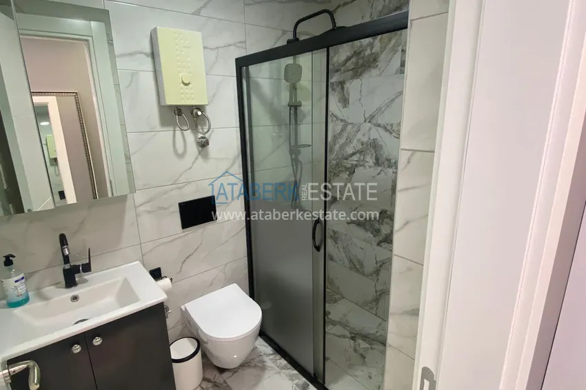 Приобрести Квартира 2+1 «под ключ» в районе Оба в комфортабельном жилом комплексе 16 