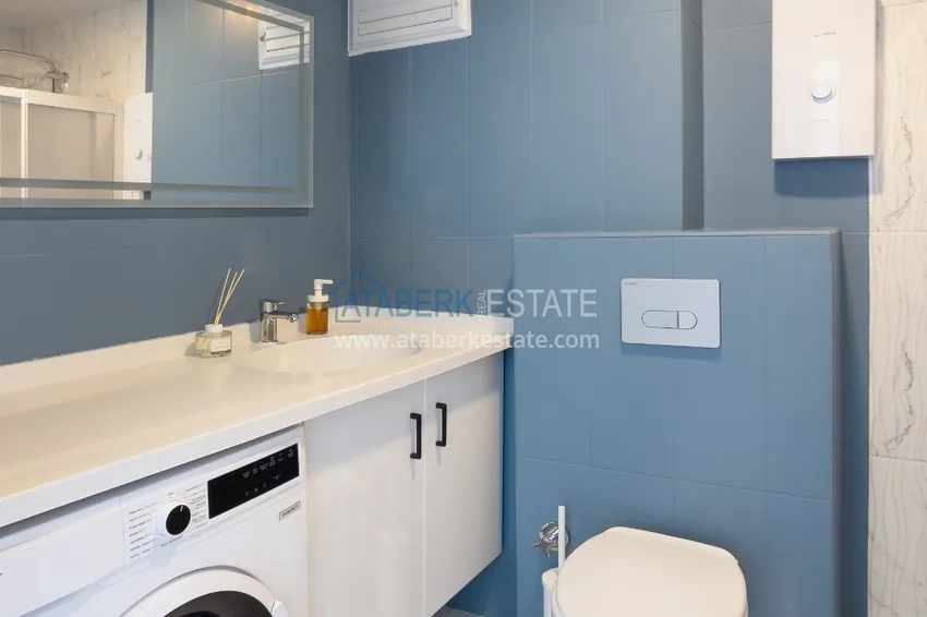 Приобрести Квартира 1+1 меблированная с дизайнерским интерьером в новостройке, район Авсаллар – Алания. Подходит для краткосрочной аренды 18 