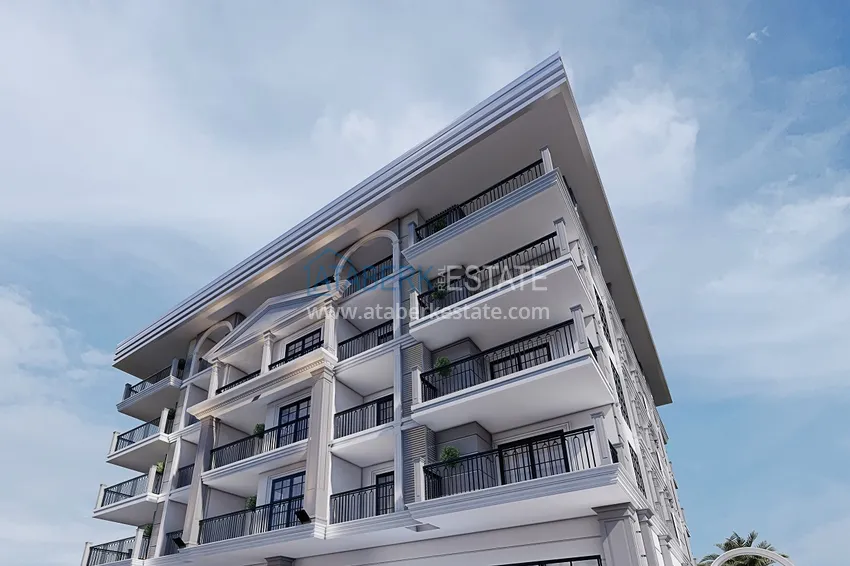 Новый проект резиденции в центре Алании – 100 метров от пляжа Кейкубат 19 