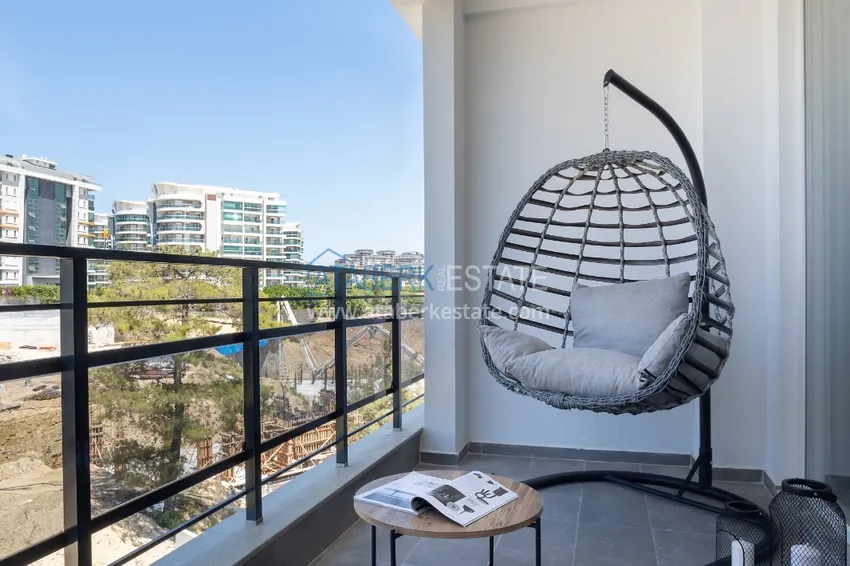 Приобрести Квартира 1+1 меблированная с дизайнерским интерьером в новостройке, район Авсаллар – Алания. Подходит для краткосрочной аренды 19 