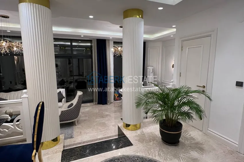 Приобрести Видовая двухэтажная вилла с роскошной мебелью и видом на море, район Махмутлар – Алания 1