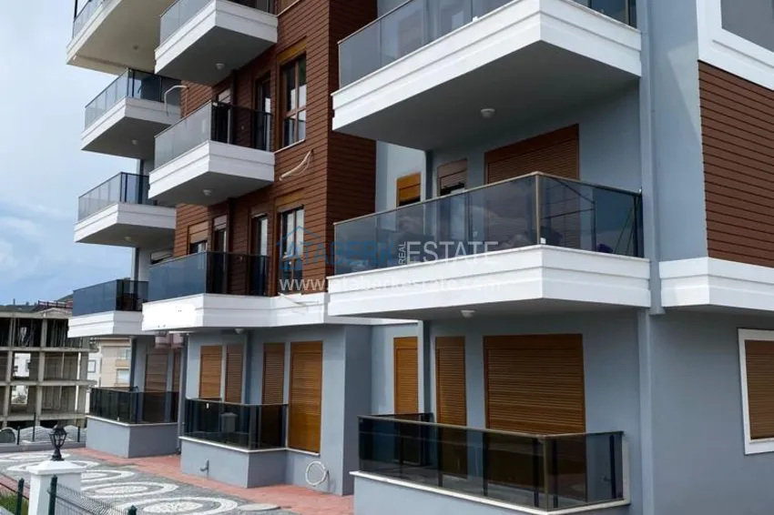 Квартира 1+1 меблированная в Газипаше в молодом комплексе городского типа 2 