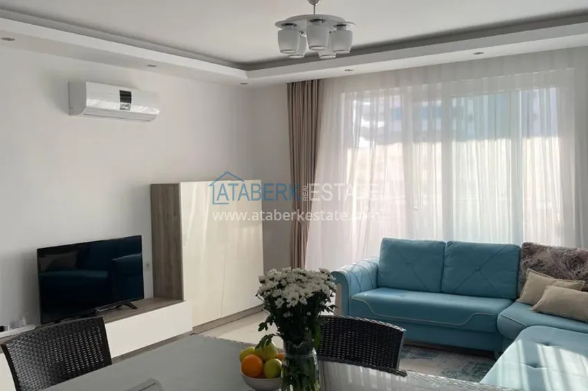 Приобрести Квартира 2+1 меблированная с видом на горы и море, район Махмутлар – Алания 3 