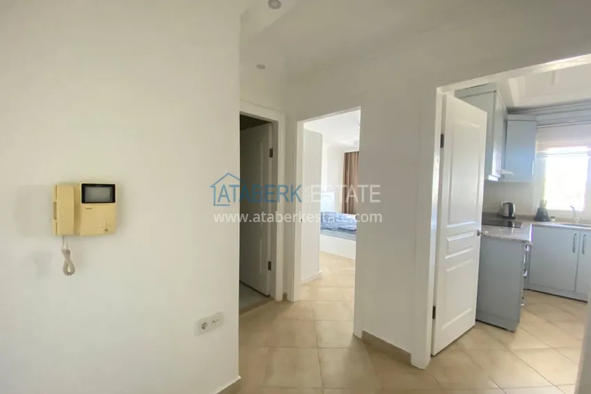 Приобрести Двухкомнатная квартира с мебелью и видом на море в комплексе на первой береговой, район Тосмур – Алания  2 