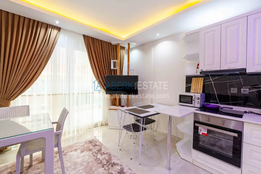 Приобрести Меблированная студия в Махмутларе – центр, первая береговая линия 3