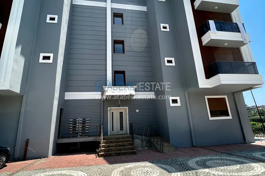 Квартира 1+1 меблированная в Газипаше в молодом комплексе городского типа 3 