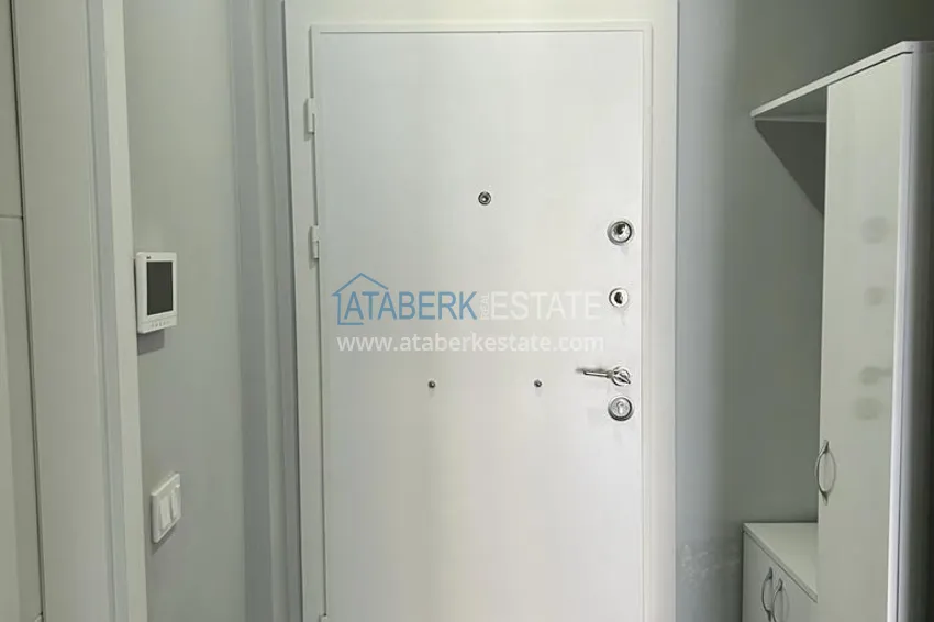 Приобрести Квартира 1+1 с мебелью и застеклённым балконом в молодом комплексе, район Махмутлар – Алания 2 