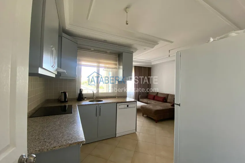 Приобрести Двухкомнатная квартира с мебелью и видом на море в комплексе на первой береговой, район Тосмур – Алания  3 