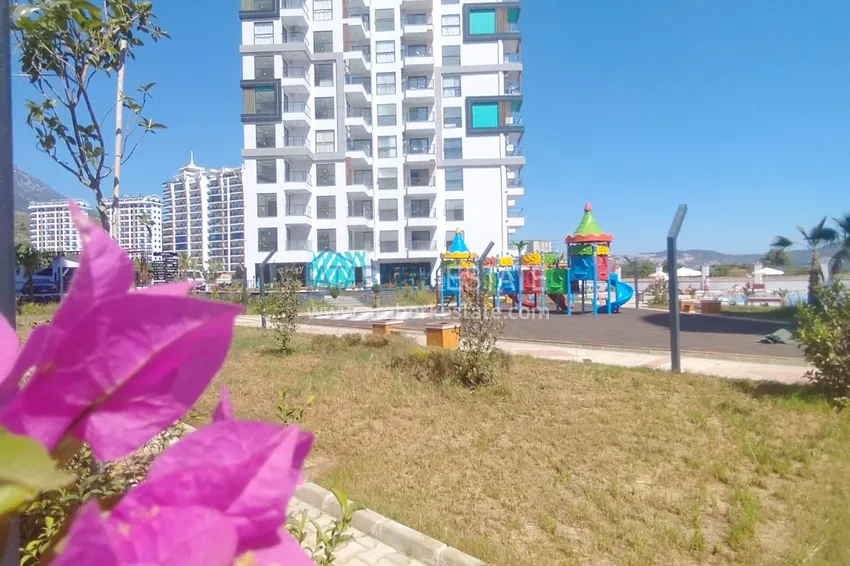 Квартира 1+1 меблированная с видом на море в новом комплексе, район Махмутлар – Алания 4 