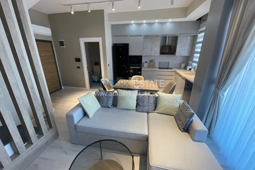 Приобрести Дуплекс 2+1 с мебелью и видом на горы в молодом современном комплексе, район Оба – Алания 3 