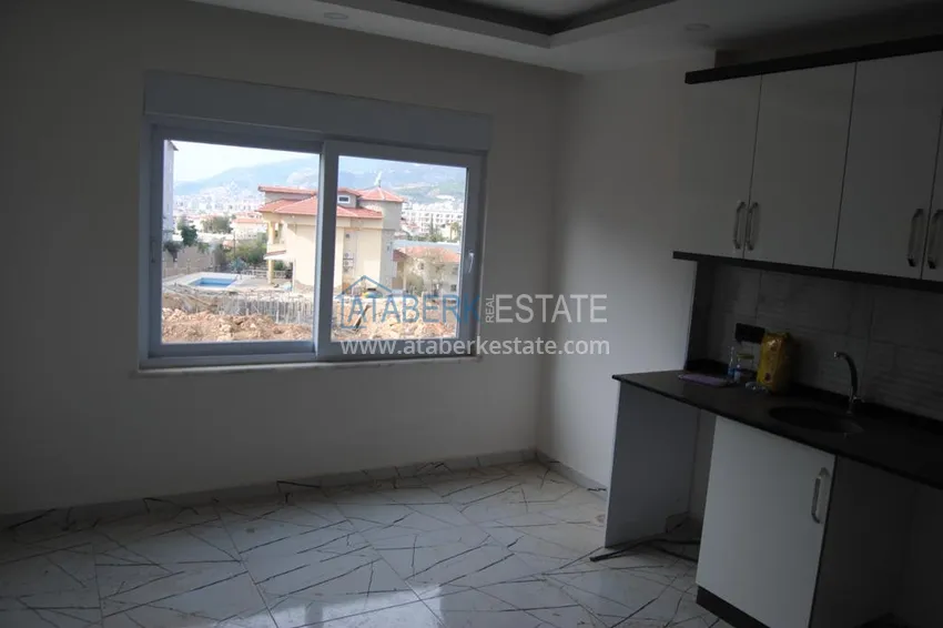 Приобрести Квартира 1+1 с видом на горы в новом комплексе с инфраструктурой, район Оба – Алания  3 