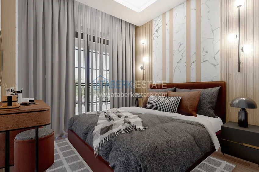 Приобрести Новый проект резиденции в центре Алании – 100 метров от пляжа Кейкубат 11 