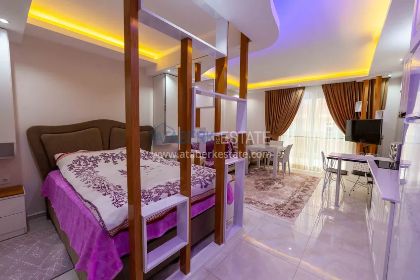 Приобрести Меблированная студия в Махмутларе – центр, первая береговая линия 9