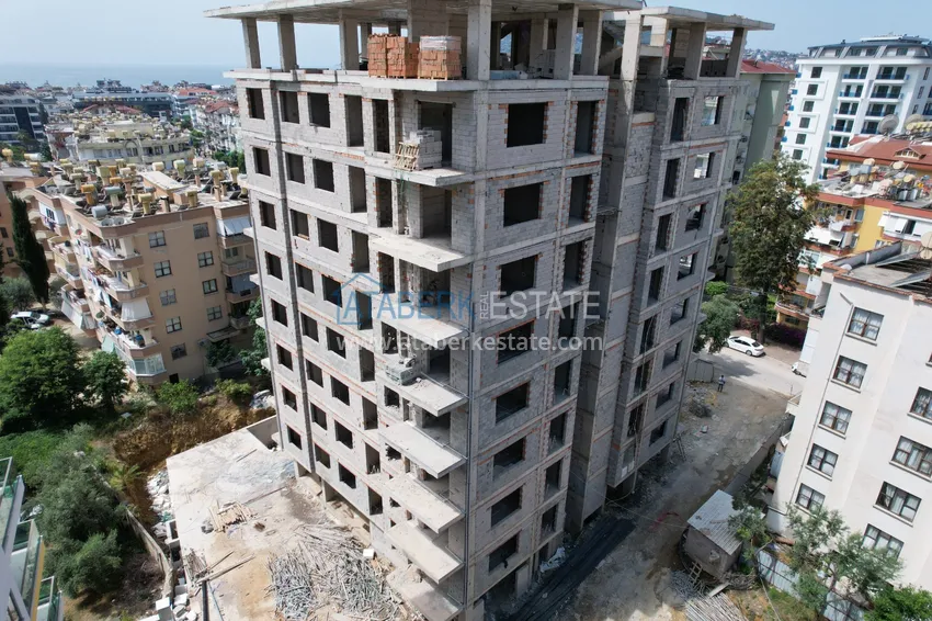 Фото - Новый проект офф-плана в центре Алании – курортная недвижимость, по минимальным стартовым ценам 7