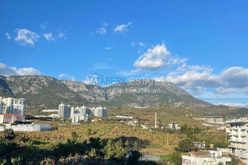 Приобрести Квартира 2+1 меблированная с видом на горы и море, район Махмутлар – Алания 9 