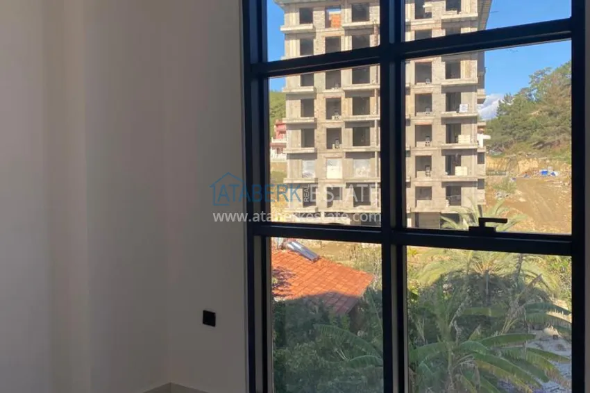 Приобрести Двухкомнатные квартиры в Алании, район Авсаллар 11 