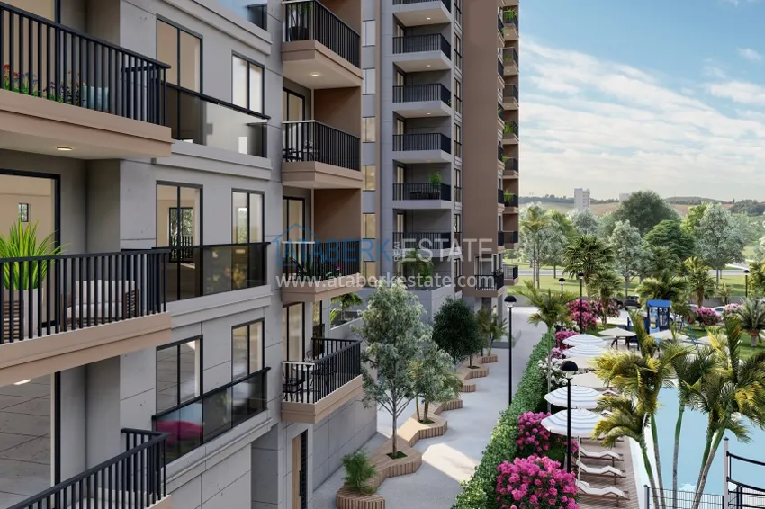 Квартира 1+1 на этапе строительства в 200 метрах от моря в районе Тедже-Мерсин 8 