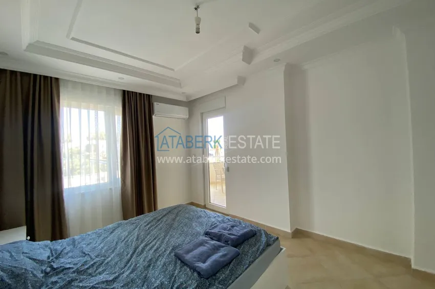 Приобрести Двухкомнатная квартира с мебелью и видом на море в комплексе на первой береговой, район Тосмур – Алания  10 