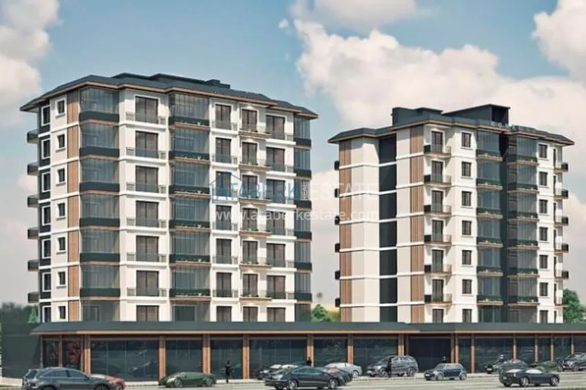 Квартиры на этапе строительства в современном жилом комплексе в районе Давултепе-Мерсин 1 