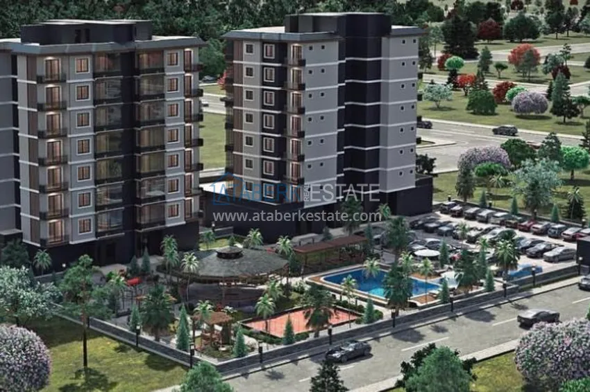 Квартиры на этапе строительства в современном жилом комплексе в районе Давултепе-Мерсин 5 
