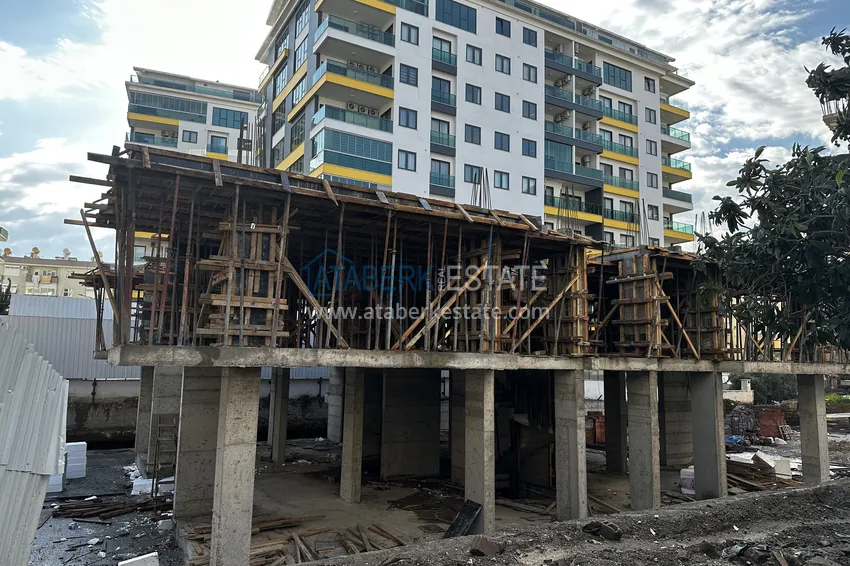 Фото - Новый проект офф-плана в центре Алании – курортная недвижимость, по минимальным стартовым ценам 11