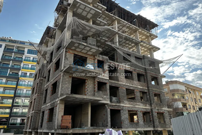 Фото - Новый проект офф-плана в центре Алании – курортная недвижимость, по минимальным стартовым ценам 12