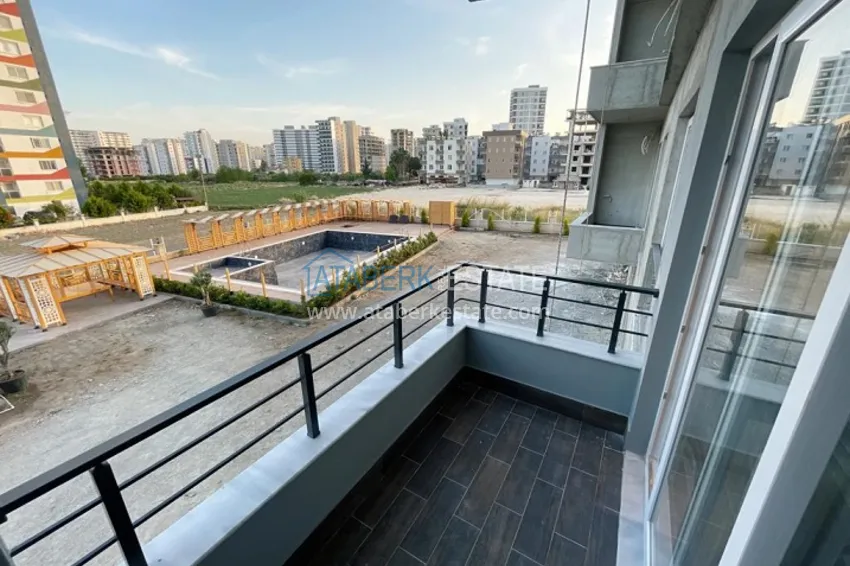 Приобрести Квартиры на завершающем этапе строительства в районе Арпачбахшиш-Мерсин 22 