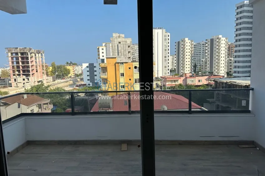 Приобрести Квартира 1+1 с чистовой отделкой в новом жилом комплексе район Арпачбахшиш – Мерсин 6 