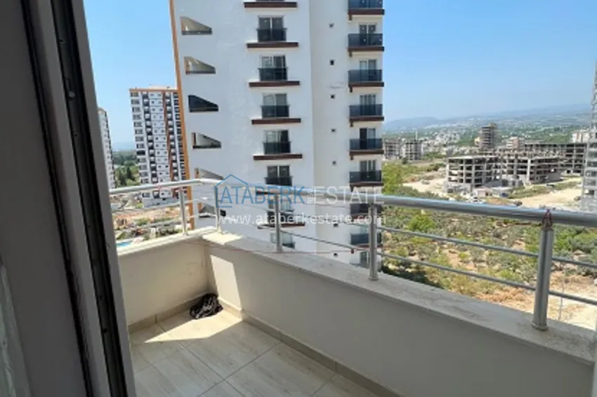 Приобрести Квартира 2+1 меблированная, частично вид на море и горы район Арпачбахшиш-Мерсин 10 