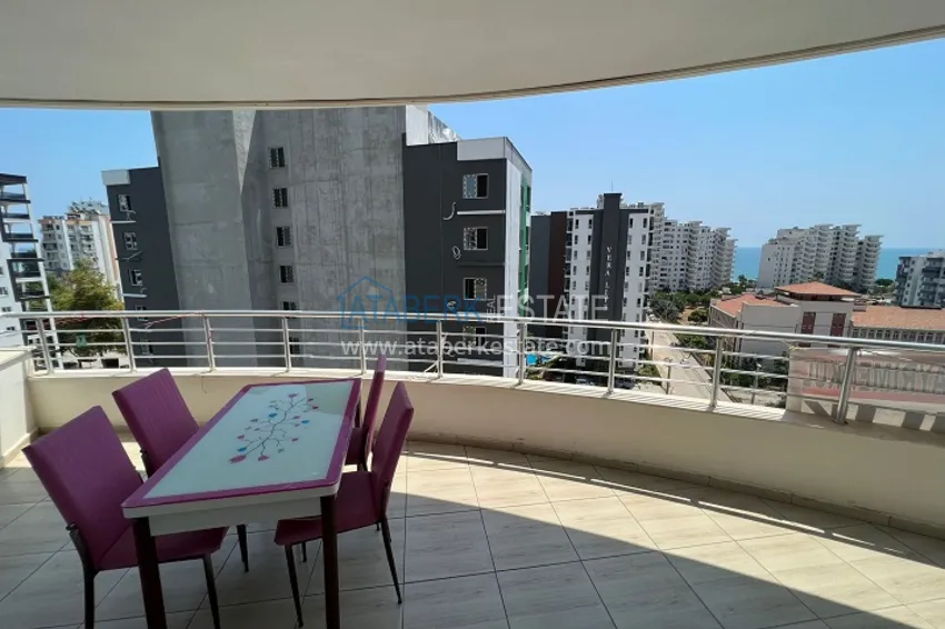 Приобрести Квартира 2+1 меблированная, частично вид на море и горы район Арпачбахшиш-Мерсин 11 