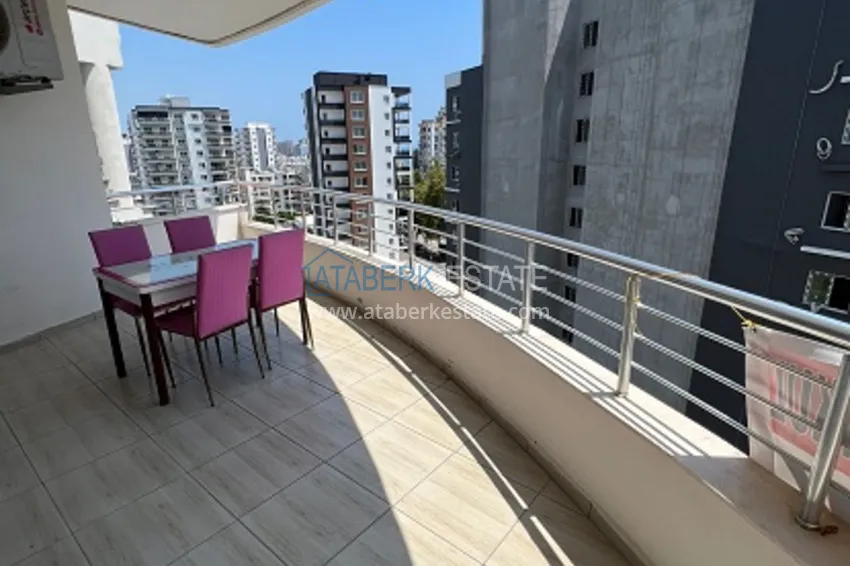 Приобрести Квартира 2+1 меблированная, частично вид на море и горы район Арпачбахшиш-Мерсин 12 