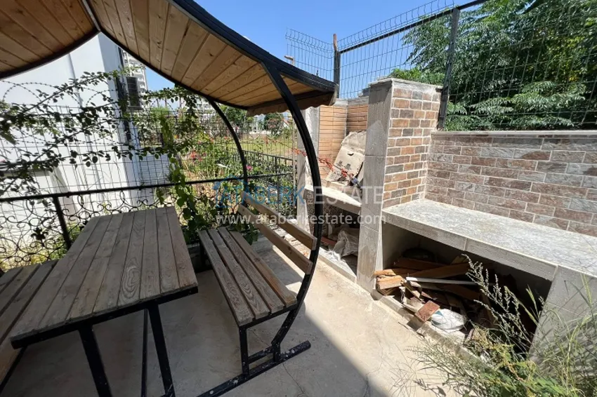 Двухэтажная вилла с террасой и частной территорией в районе Чешмели-Мерсин 4 