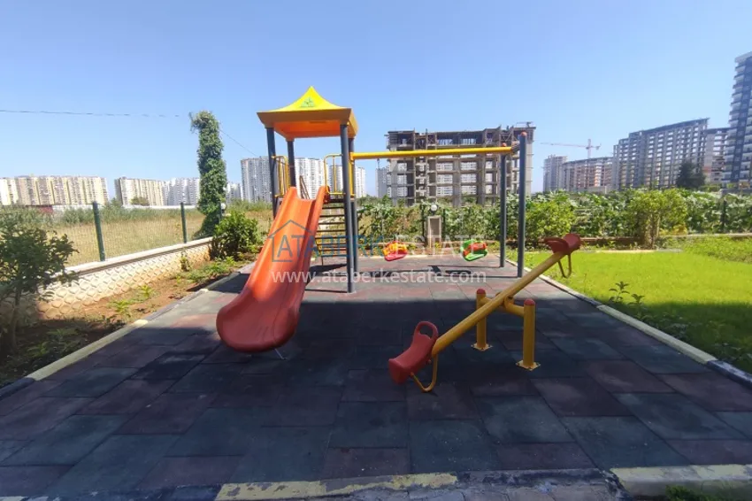 Квартиры 1+1 с чистовой отделкой в новом жилом комплексе в районе Томюк – Мерсин 3 