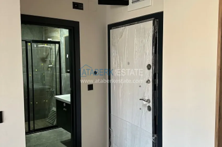 Приобрести Квартира 1+1 с чистовой отделкой в новом жилом комплексе район Арпачбахшиш – Мерсин 3 