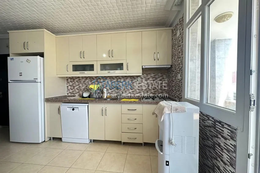 Приобрести Квартира 2+1 меблированная с видом на море район Аяш-Мерсин 10 