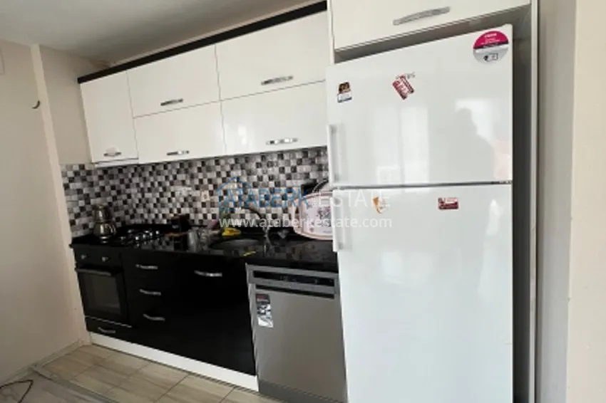 Приобрести Квартира 2+1 меблированная, частично вид на море и горы район Арпачбахшиш-Мерсин 6 