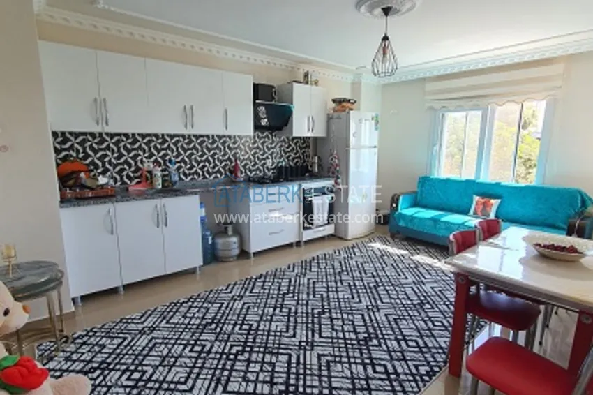 Приобрести Квартира 2+1 в молодом жилом комплексе в районе Эрдемли-Мерсин 1 