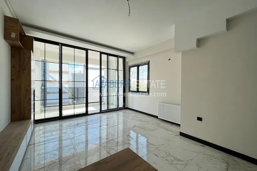 Приобрести Квартира 2+1 в комплексе с инфраструктурой комфорт-класса район Чифтликкей-Мерсин 4 