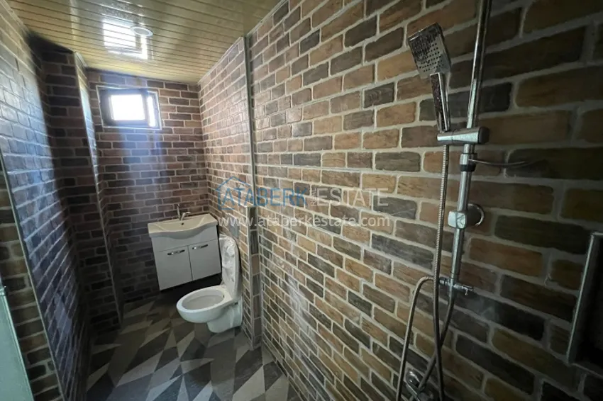 Приобрести Двухэтажная вилла с террасой и частной территорией в районе Чешмели-Мерсин 13 