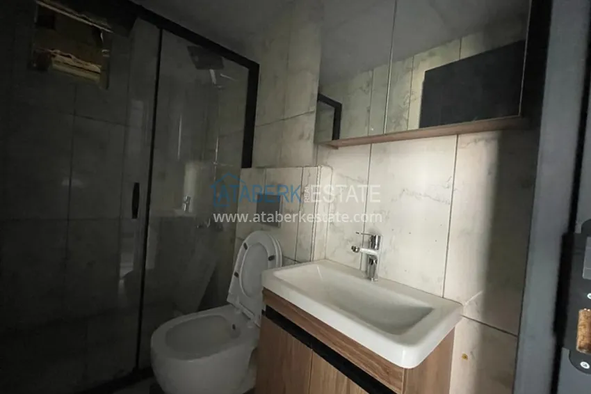 Приобрести Квартира 1+1 с чистовой отделкой в районе Тедже-Мерсин 5